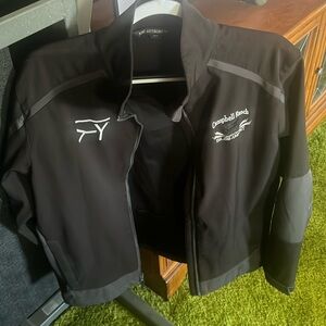 Very nice never worn rain coat, has ranch brand from Montana